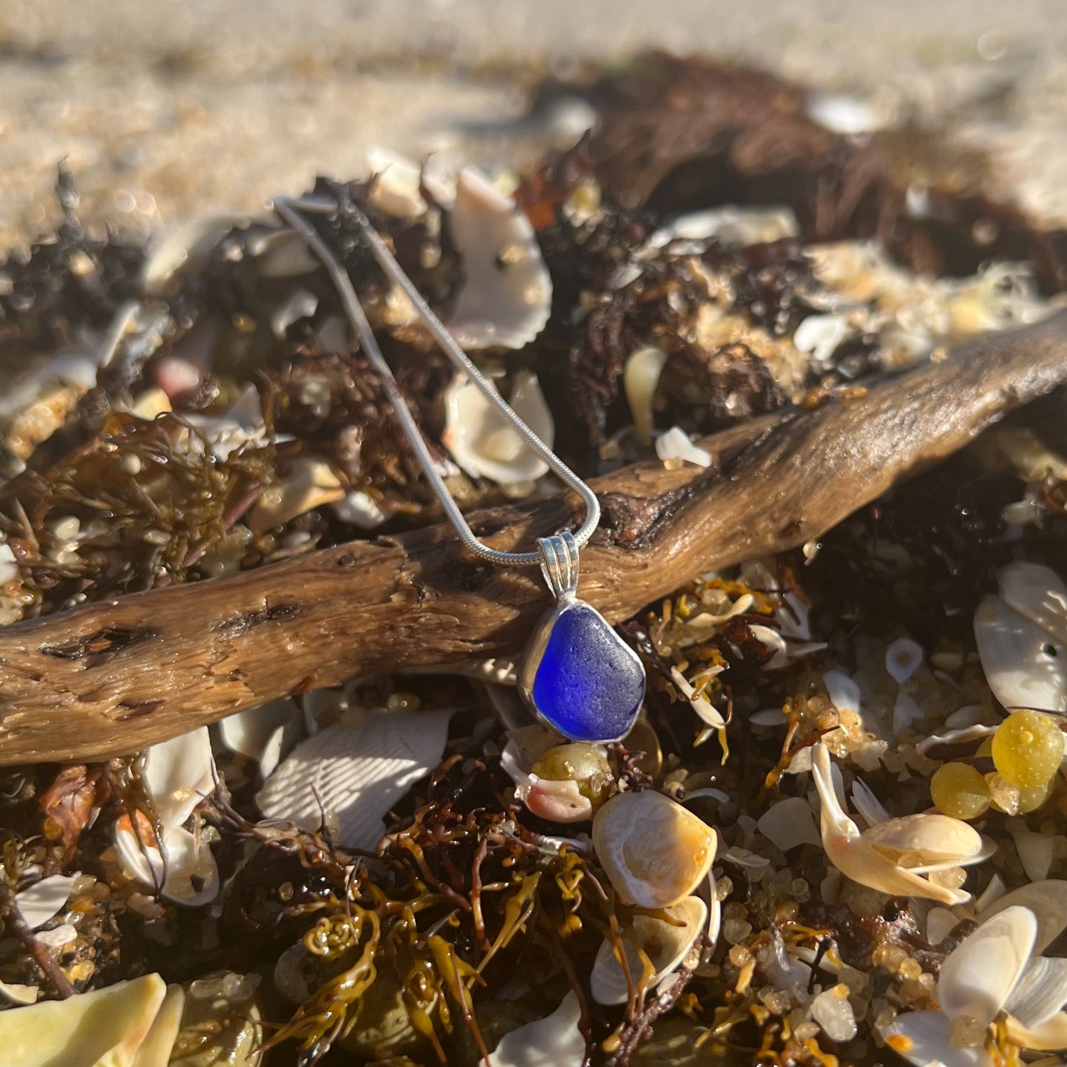 Cobalt blue sea glass set in Argentium silver to the exact shape it washed ashore. Hangs on a 40 or 45cm sterling silver chain. Pendant by Mornington Sea Glass.