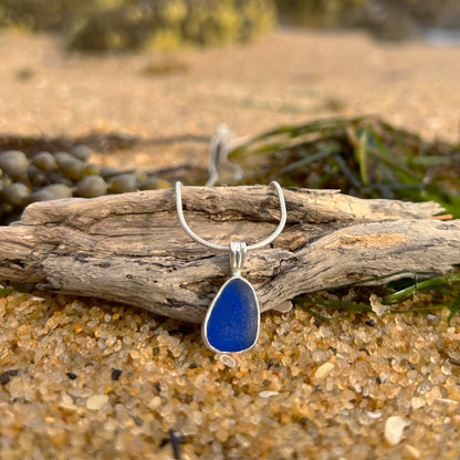 Cobalt blue sea glass set in Argentium silver to the exact shape it washed ashore. Hangs on a 40 or 45cm sterling silver chain. Pendant by Mornington Sea Glass.