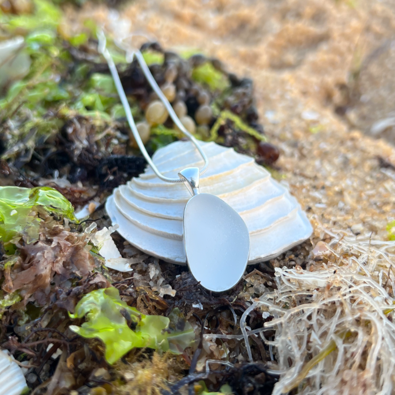 White Sea glass set in silver pendant by Mornington Sea Glass. Hangs on a 40cm  or 45cm sterling silver snake chain