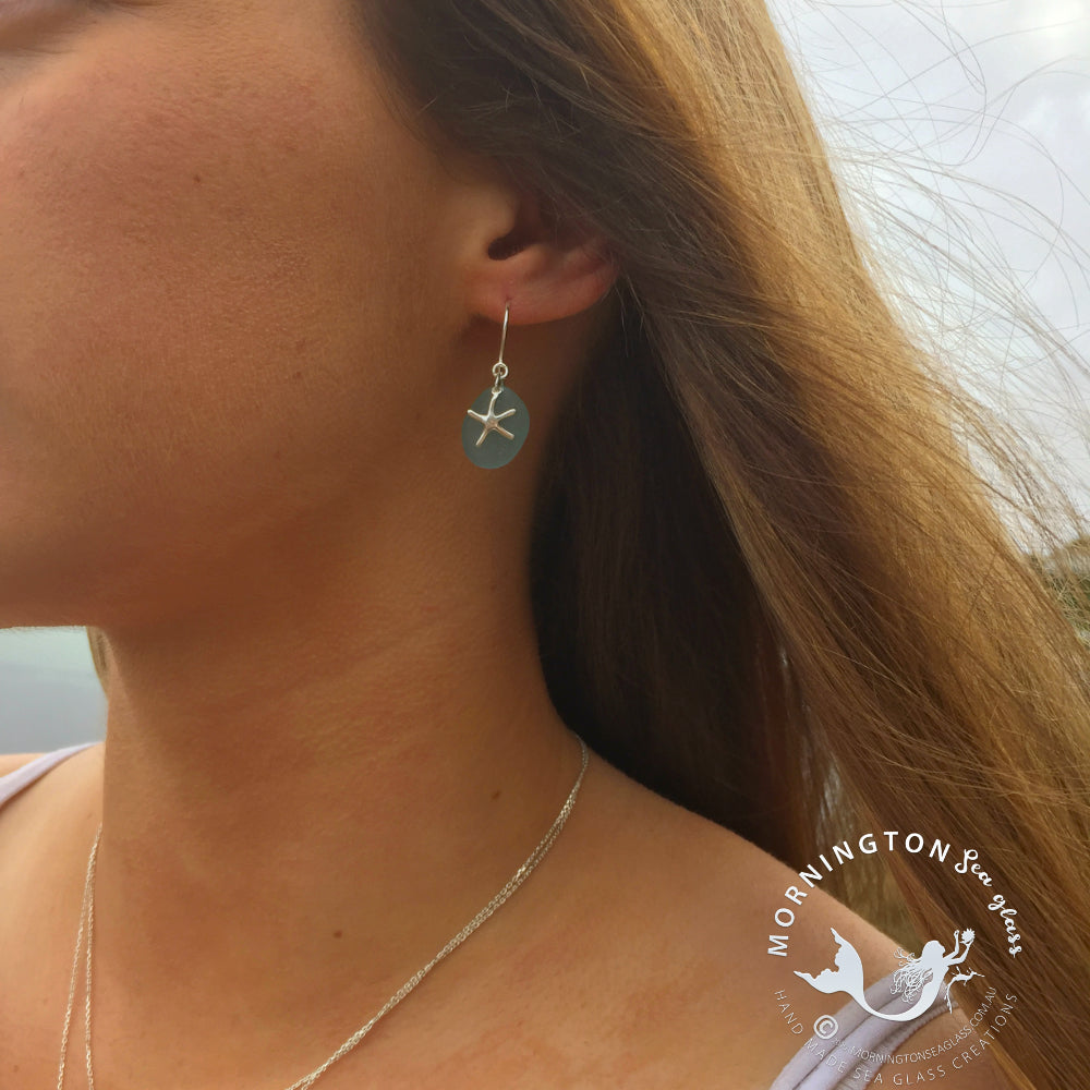 Model wearing sea glass and silver sea star earrings by Mornington Sea Glass.
