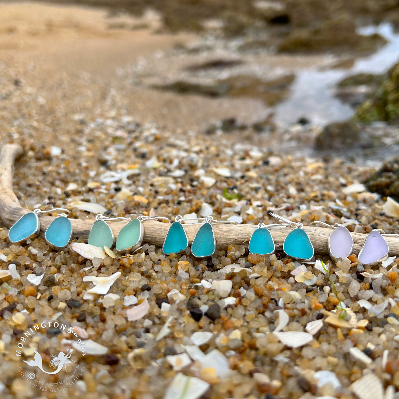 Sea glass set in silver earrings by Mornington Sea Glass.