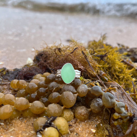 Seafoam sea glass set in silver on a cast driftwood inspired silver ring band by Mornington Sea Glass. Size 8 3/4.