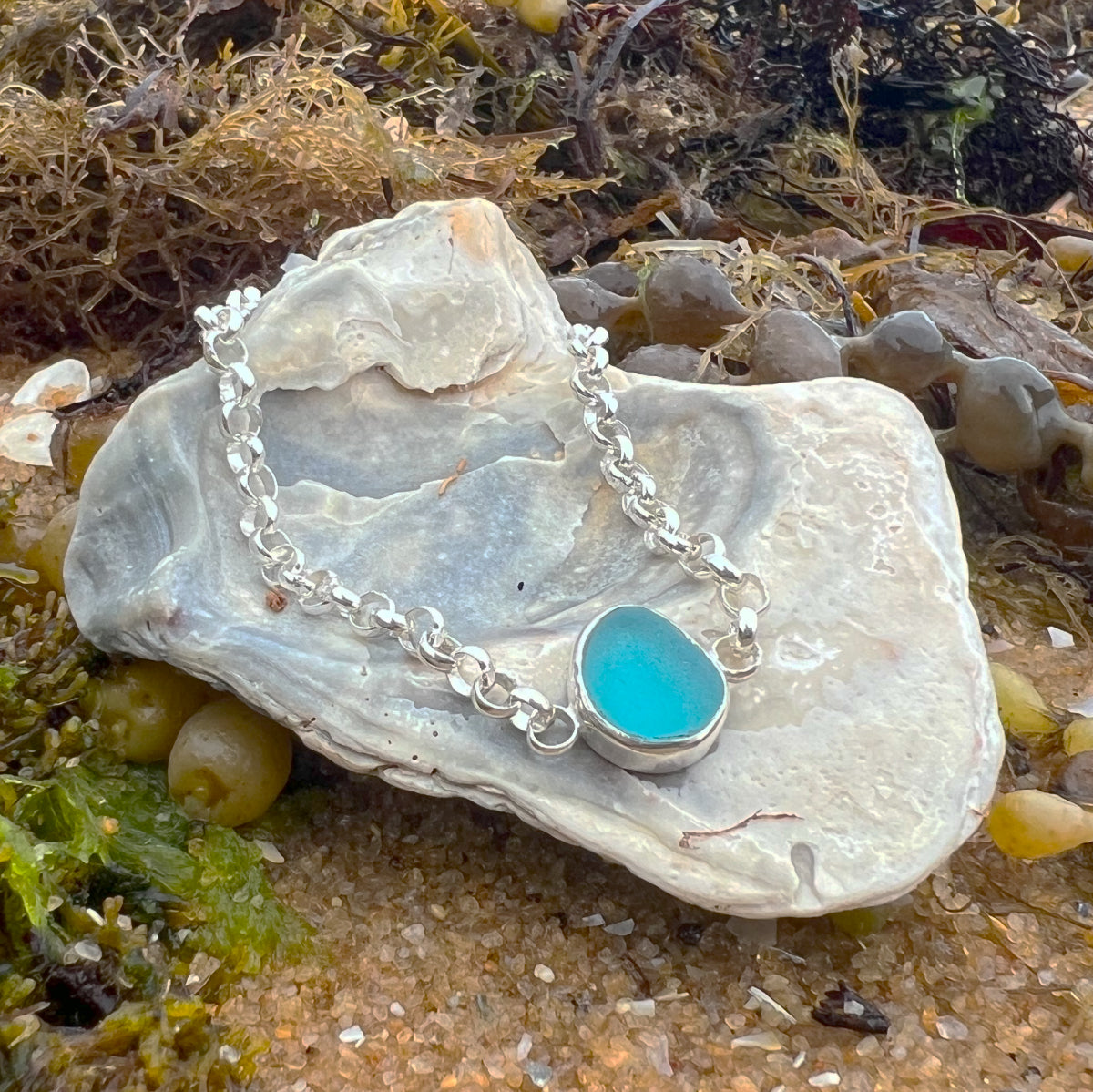 Ocean teal sea glass set in silver bracelet by Mornington Sea Glass. 19.5cm length.