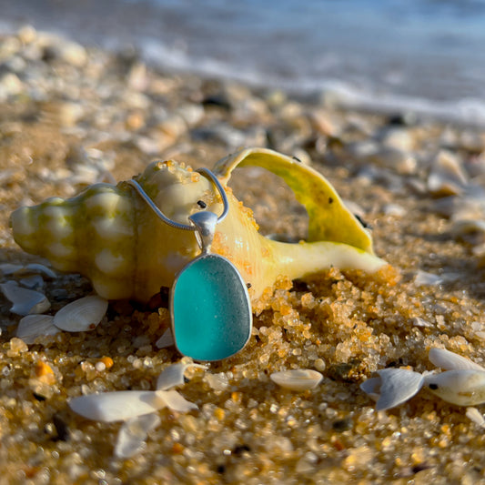 Teal sea glass set in silver pendant by Mornington Sea Glass. Comes with a 40 or 45cm snake chain.