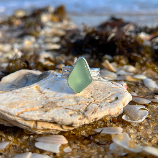 Seafoam sea glass set in silver on a cast driftwood inspired silver ring band by Mornington Sea Glass.
