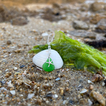 Green sea glass and silver sea star charm necklace by Mornington Sea Glass. Comes with a 40cm + 5cm  sterling silver curb with ball detail chain.