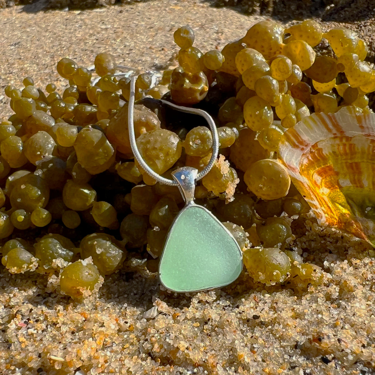 Soft seafoam green sea glass set in silver pendant by Mornington Sea Glass. Comes with a 40 or 45cm sterling silver snake chain