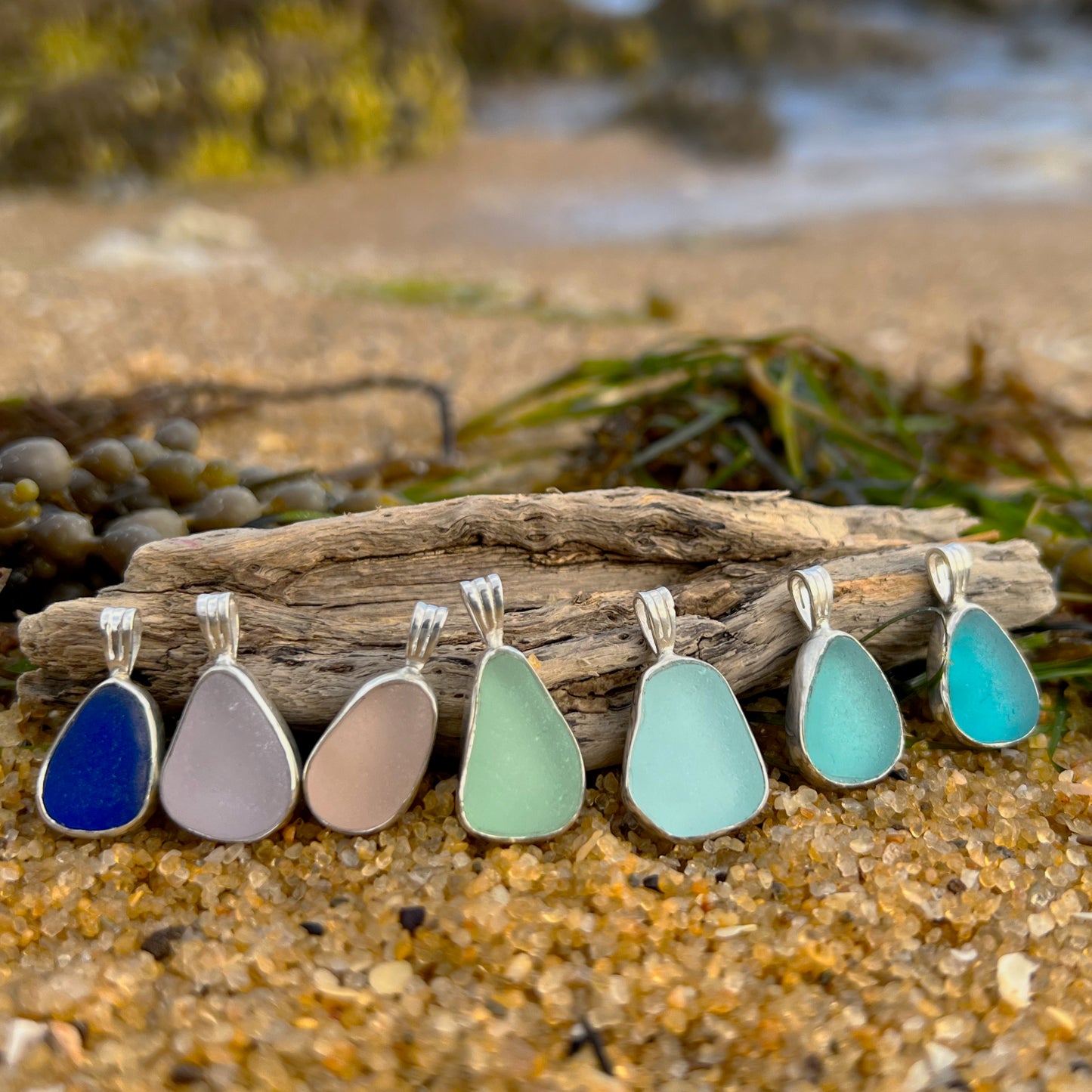 Sea glass set in silver pendants by Mornington Sea Glass